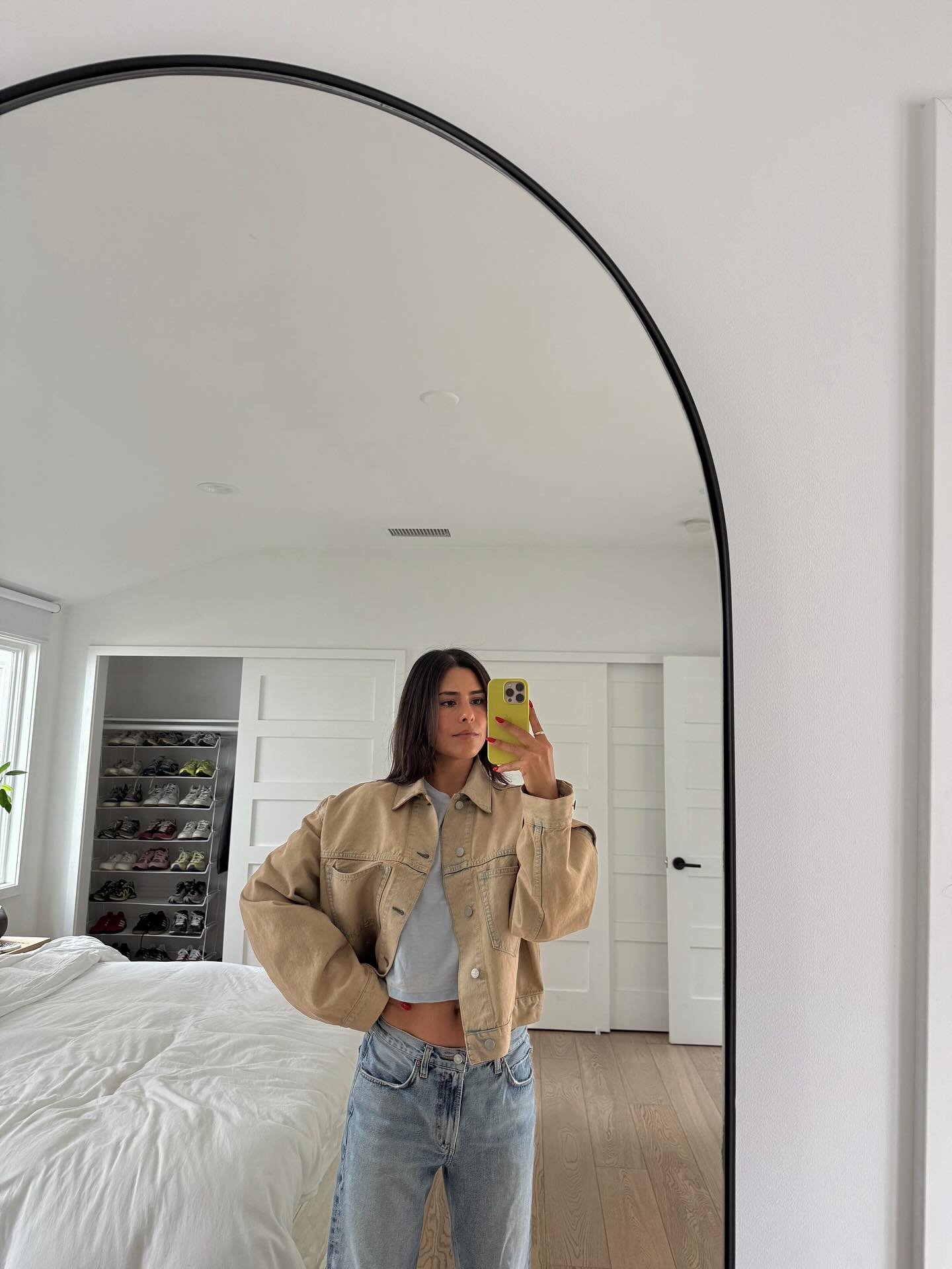 Woman wearing khaki denim trend 2025.