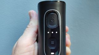 Review photo of the Bitvae C2 Water Flosser in the author's hand