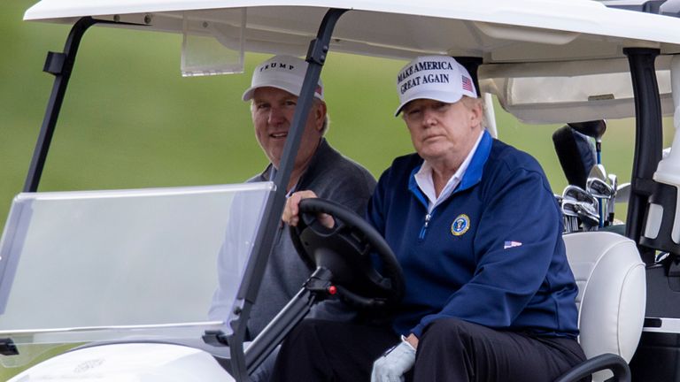 Donald Trump in his golf cart in 2020
