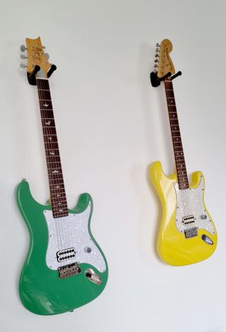 The John Delonge sits alongside it’s inspiration – Fender’s Tom DeLonge Stratocaster