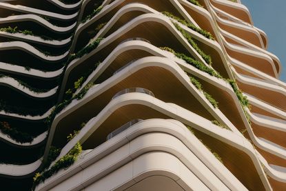 Park Nova, a tower with a vertical garden in Singapore, showing tropical greenery on balconies