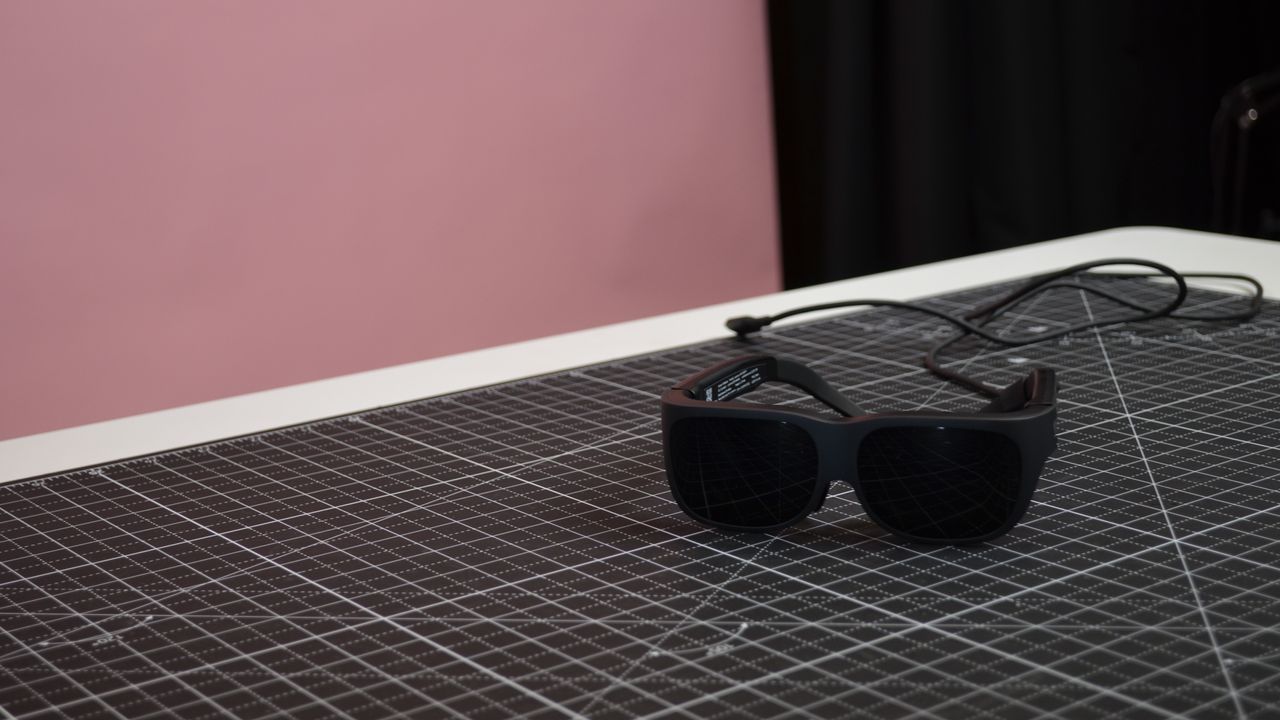 Lenovo Legion Glasses on table
