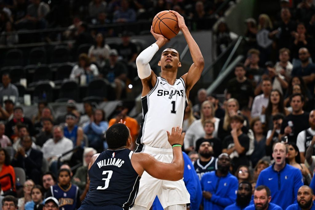 San Antonio Spurs&#039; French forward-center #01 Victor Wembanyama shoots the ball past Dallas Mavericks&#039; US power forward #03 Grant Williams during the NBA basketball game between the Dallas Mavericks and the San Antonio Spurs at the AT&amp;T Center in San Antonio, Texas on October 25, 2023.