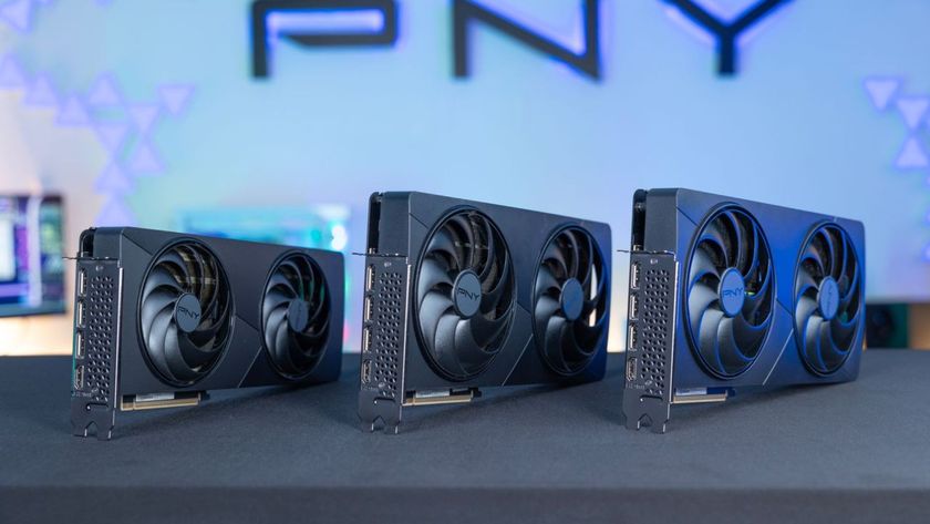 Three PNY Slim RTX 50 Series GPUs laid on a table