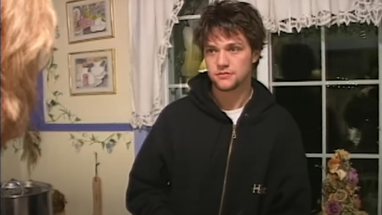 Bam Margera looking innocent while standing in his parent's kitchen in Viva La Bam.
