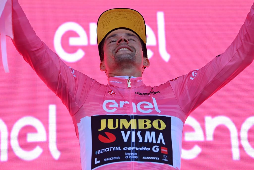 MONTE LUSSARI ITALY MAY 27 Primo Rogli of Slovenia and Team JumboVisma celebrates at podium as Pink Leader Jersey winner during the 106th Giro dItalia 2023 Stage 20 a 186km individual climbing time trial stage from Tarvisio 750m to Monte Lussari 1744m UCIWT on May 27 2023 in Monte Lussari Italy Photo by Tim de WaeleGetty Images