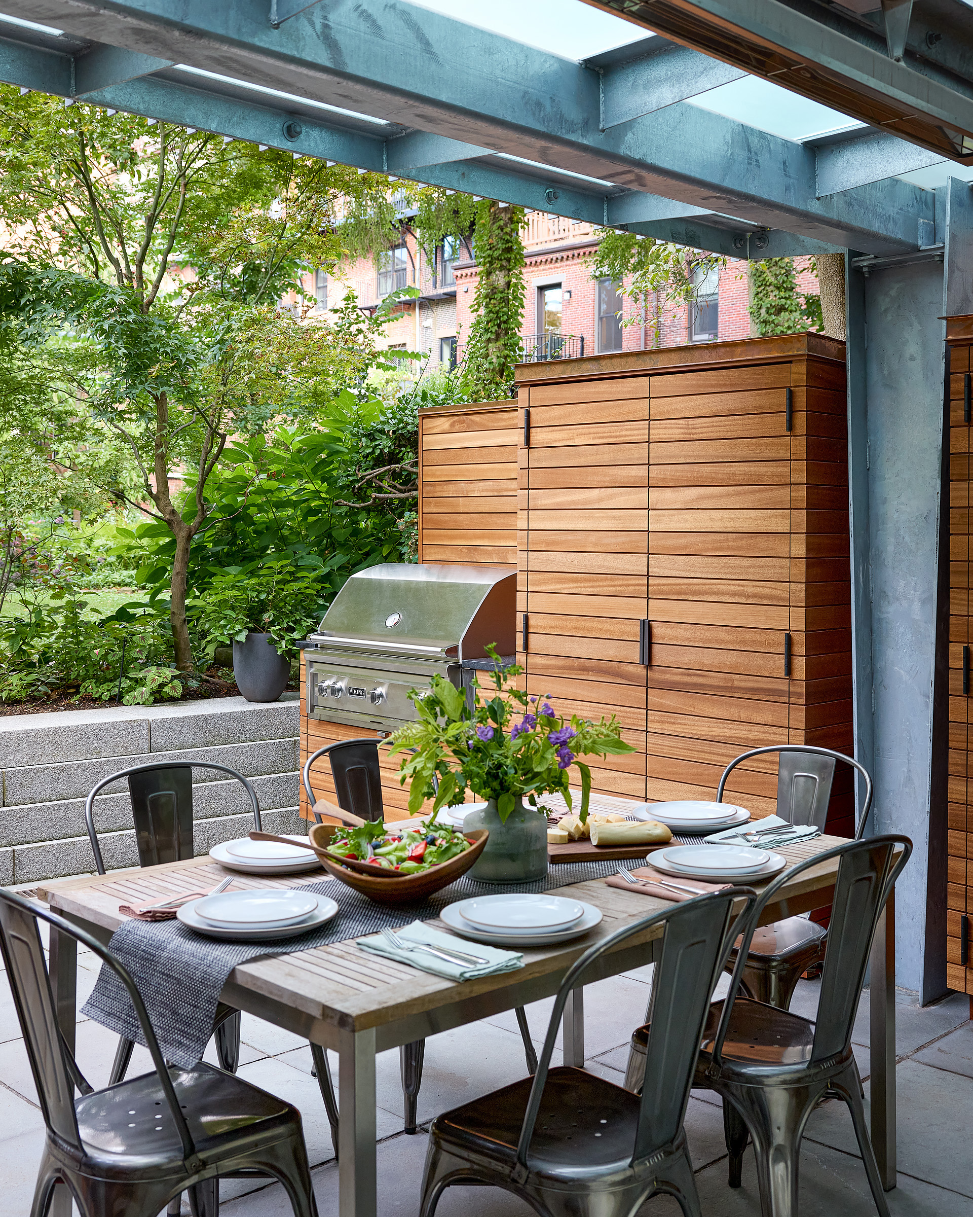 outdoor patio under a glass deck
