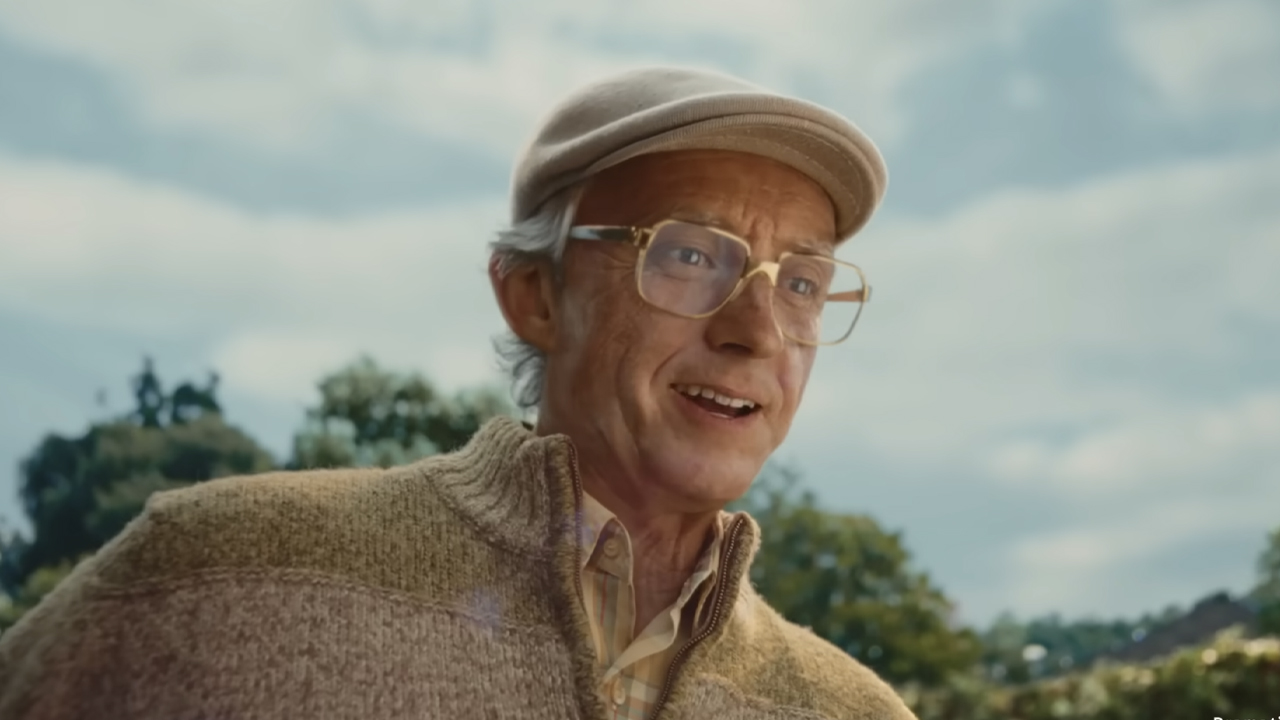 Tom Holland unrecognizable as an elderly man in the LEGO short film 'Never Stop Playing.'