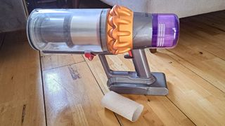 Handheld vacuum cleaner and cardboard tube