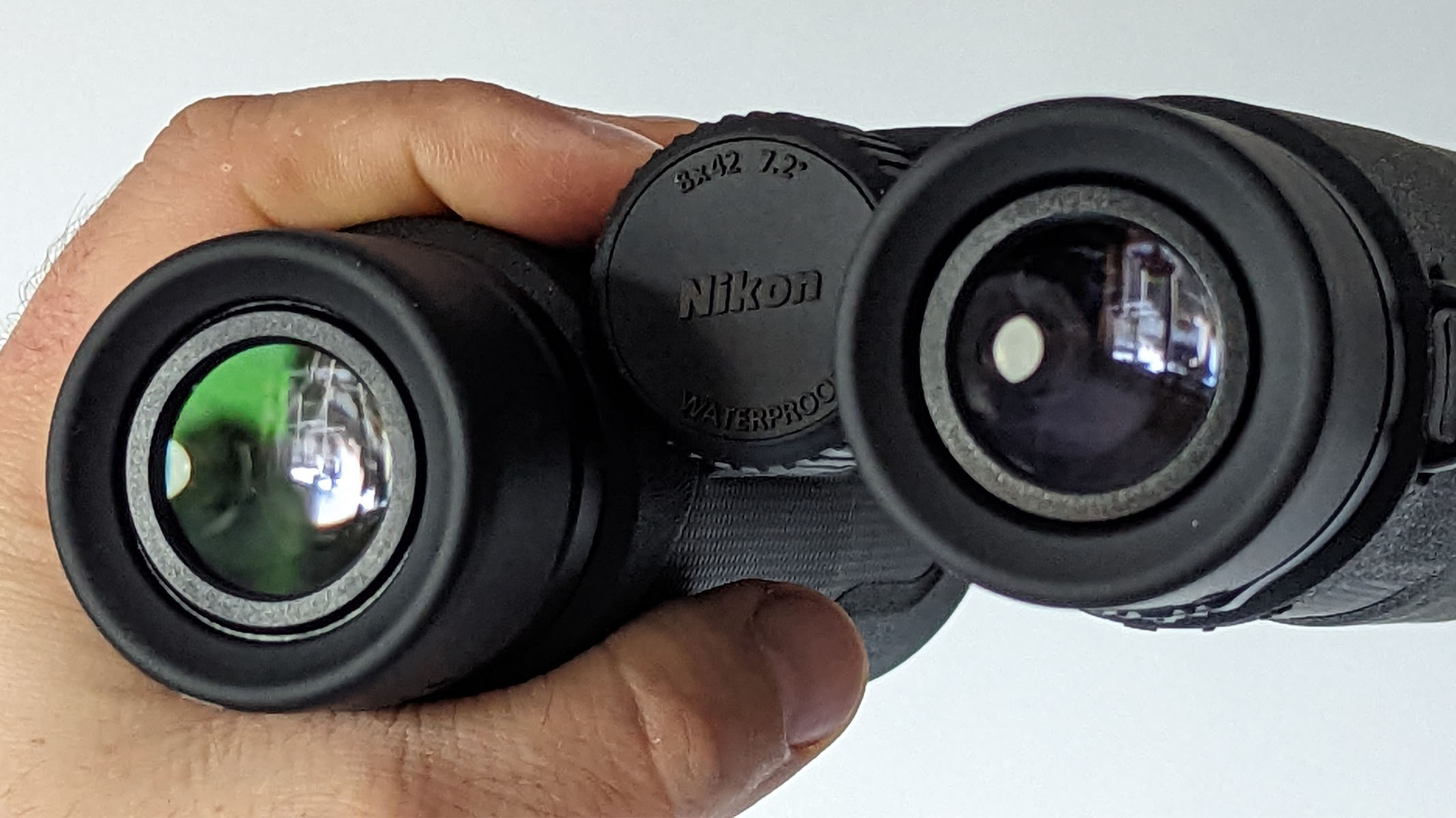 Nikon Prostaff P3 8x42 binoculars eye lenses close up.