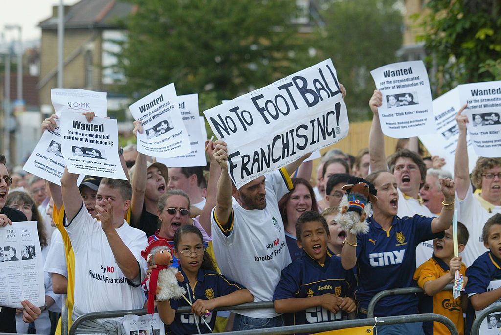 LONDON - AUGUST 10: Fans before the start of the Wimbledon v Gillingham Nationwide League Division One at Selhurst Park in London, England on August 10, 2002. (Photo by Phil Cole/Getty Images)