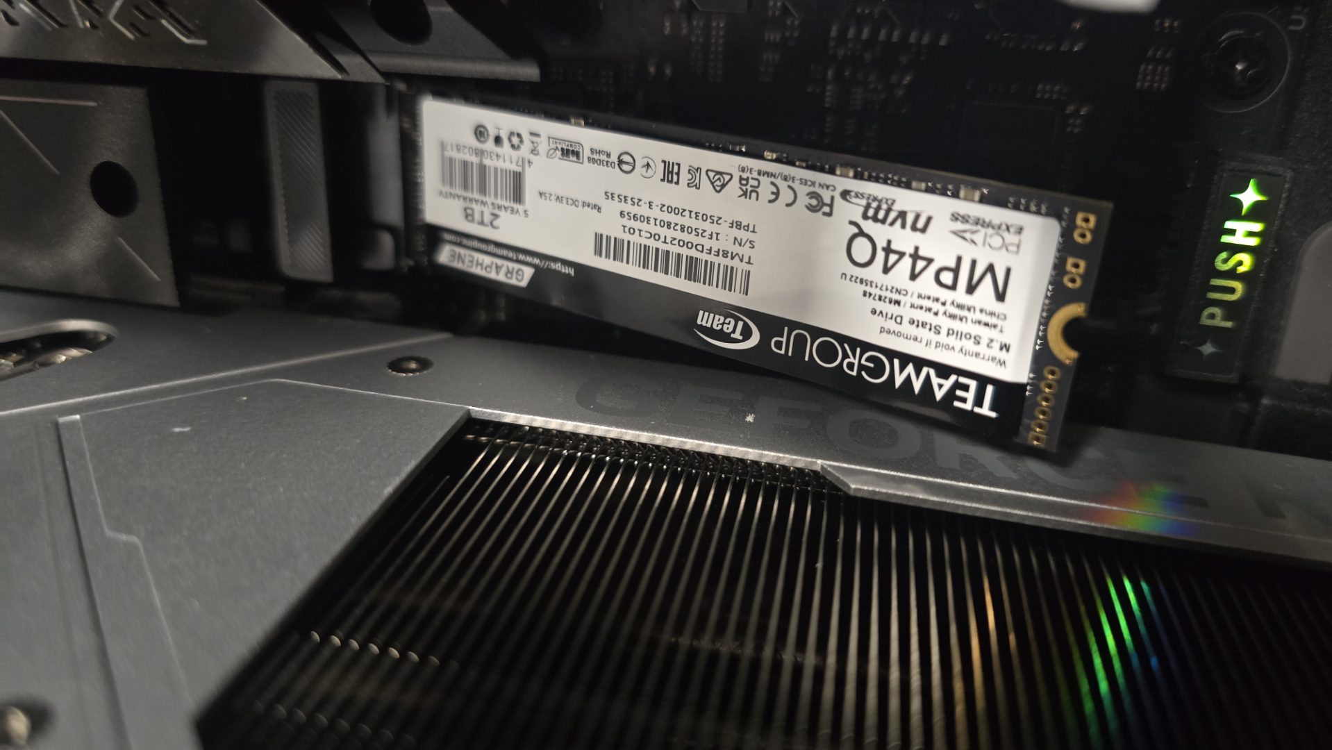 Teamgroup MP44Q SSD on a desk.