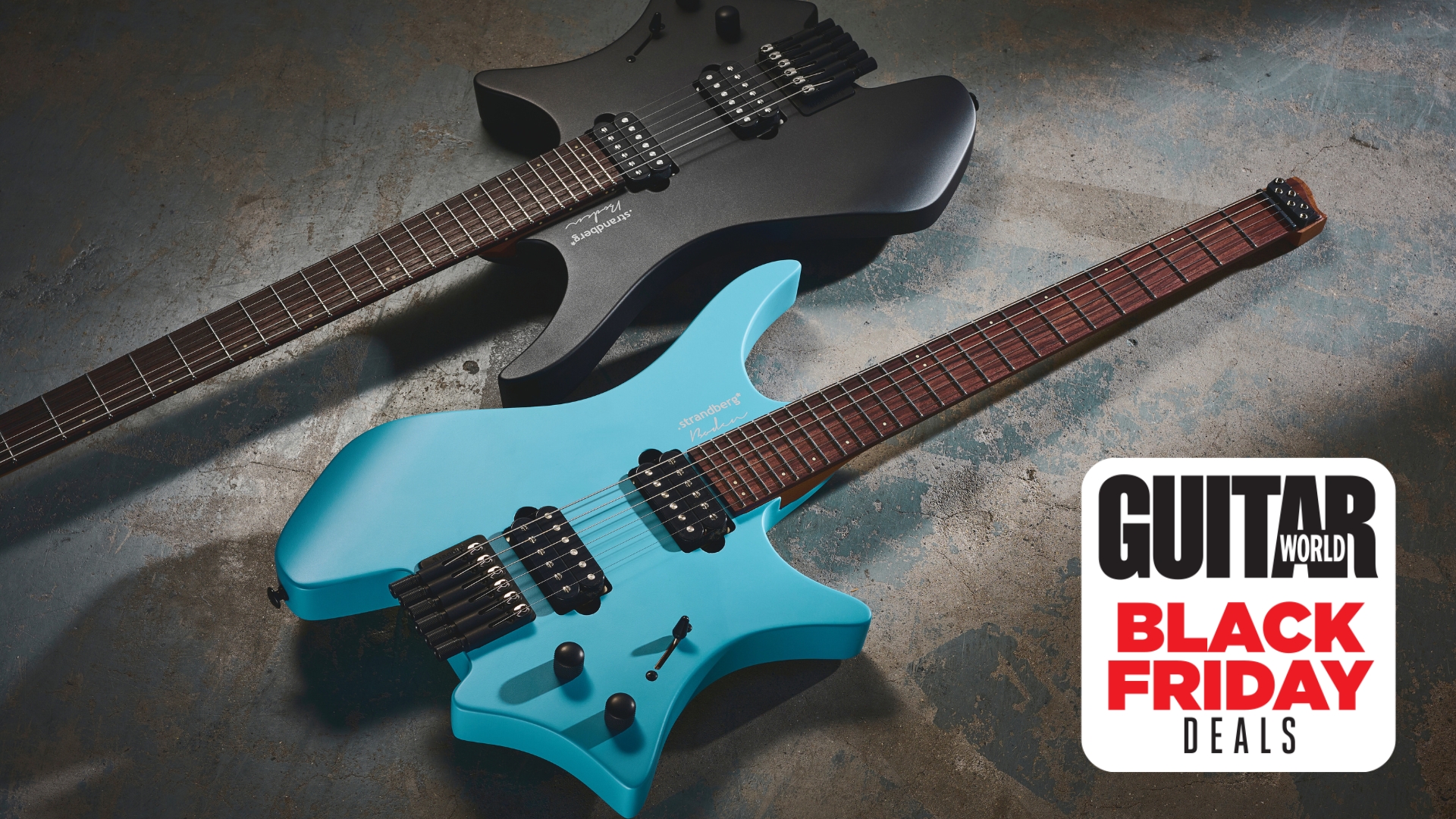 A pair of Strandberg Boden Essential headless guitars lying on a concrete floor