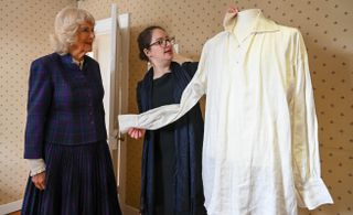 Lizzie Dunford (Director, Jane Austen’s House) shows Duchess Camilla the white shirt worn by Colin Firth in the BBC’s 1995 adaptation of Pride and Prejudice