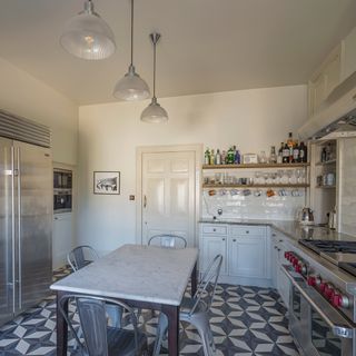 kitchen with cabinets and dining table