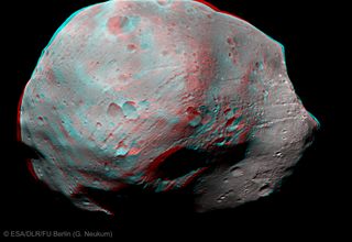 This photo, taken by Mars Express' High Resolution Stereo Camera, shows a 3-D view of the pockmarked surface of Phobos created by years of impacting meteorites.