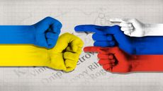 Fists and hands the colours of Ukrainian and Russian flags