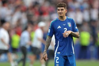 Giovanni Di Lorenzo of Italy reacts as he applauds the fans following the 2-0 defeat and exit from the tournament during the UEFA EURO 2024 round of 16 match between Switzerland and Italy at Olympiastadion on June 29, 2024 in Berlin, Germany