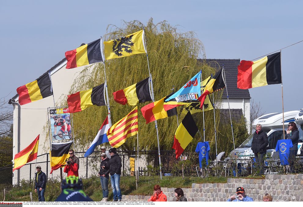 Belgian and Flemish flags fly in the wind