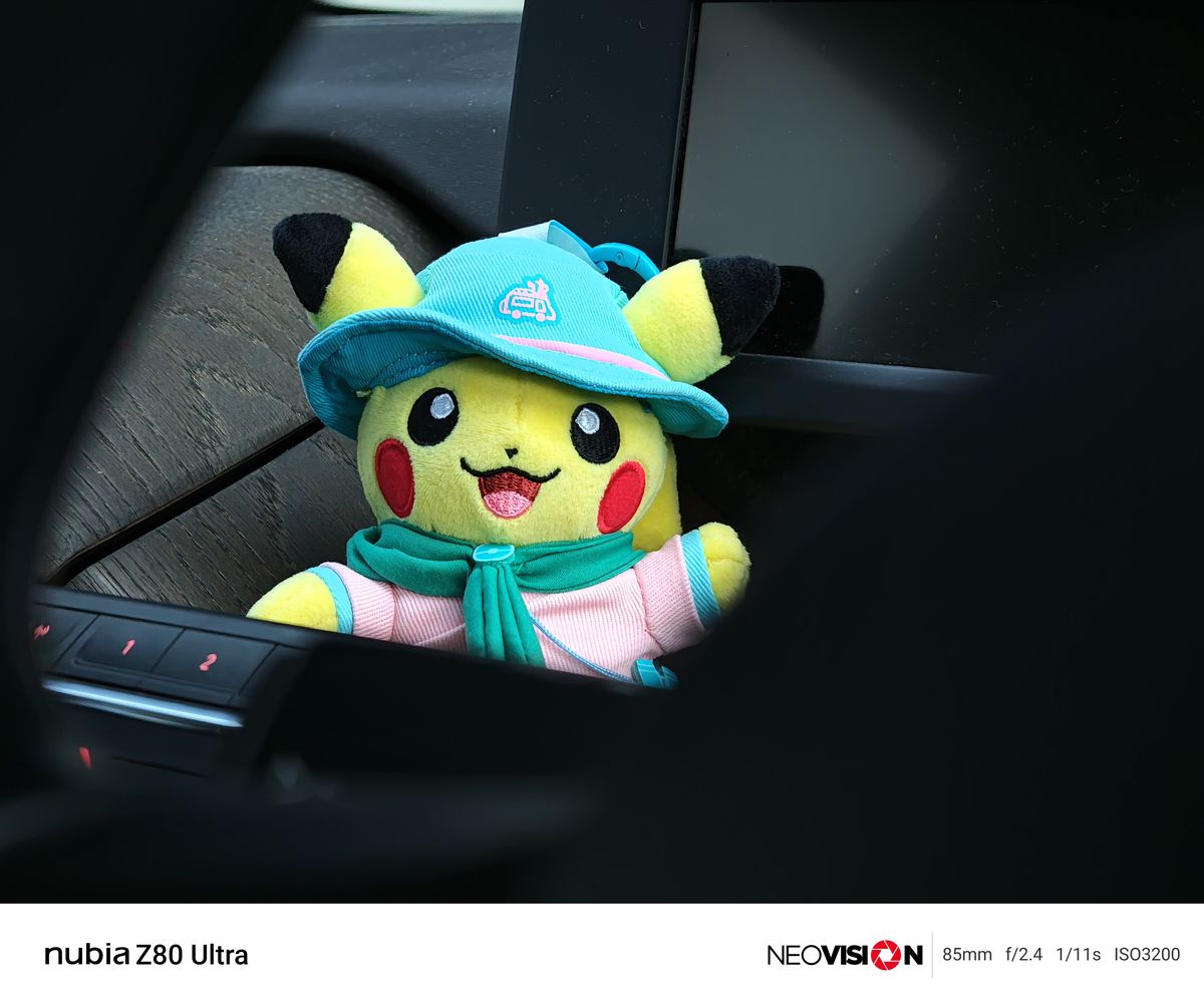 Pikachu toy in a car