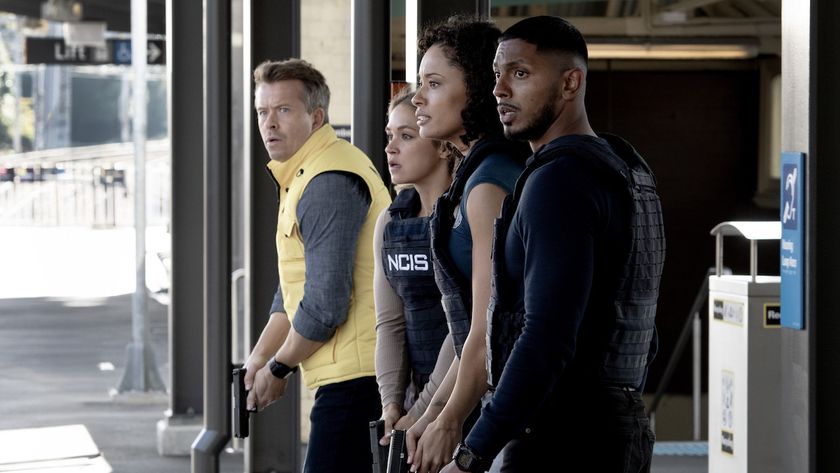 JD (wearing a yellow vest), Evie, Mackey and DeShawn with guns drawn in NCIS: Sydney