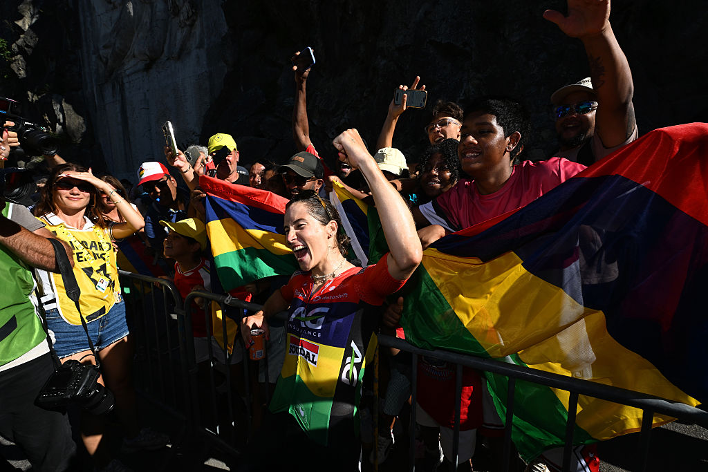 Stage winner Kimberley Le Court Pienaar of Mauritius and Team AG Insurance - Soudal celebrates at the finish with the fans