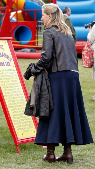 Duchess Sophie reads a sign at the Royal Windsor Horse Show in 2017