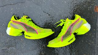 Puma Fast-R 2 Nitro Elite running shoes in neon yellow Ekiden colorway on Tarmac