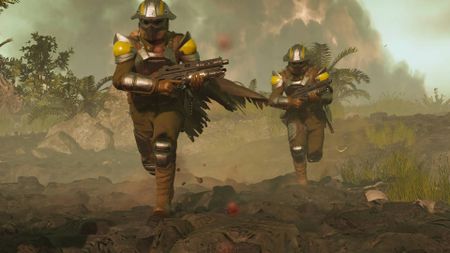 Helldivers 2 Entrenched Division warbond helldivers in sapper armor running across no-man's-land 