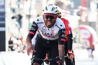 Colombia's Sebastian Molano of UAE Team Emirates celebrates after winning the 'Classic Brugge-De Panne' men's elite one-day cycling race, 195,6 km from Bruges to De Panne in De Panne, on March 26, 2025. (Photo by KURT DESPLENTER / Belga / AFP) / Belgium OUT