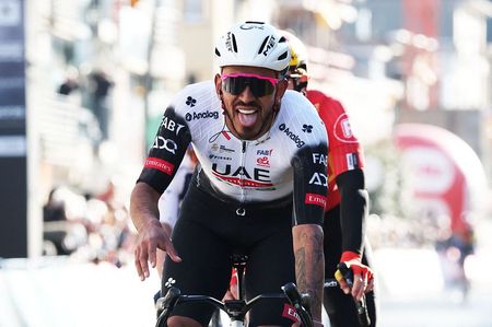 Colombia's Sebastian Molano of UAE Team Emirates celebrates after winning the 'Classic Brugge-De Panne' men's elite one-day cycling race, 195,6 km from Bruges to De Panne in De Panne, on March 26, 2025. (Photo by KURT DESPLENTER / Belga / AFP) / Belgium OUT