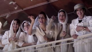 The women of the congregation up on the temple balcony in The Women's Balcony