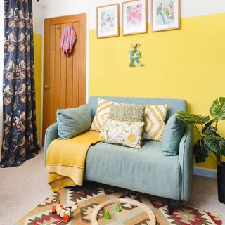 childs bedroom with yellow painted wall