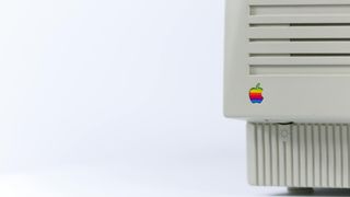 Photo of the logo on the side of a 1970s Apple computer