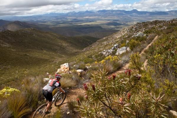 A rider negotiates a section of singletrack on stage 4