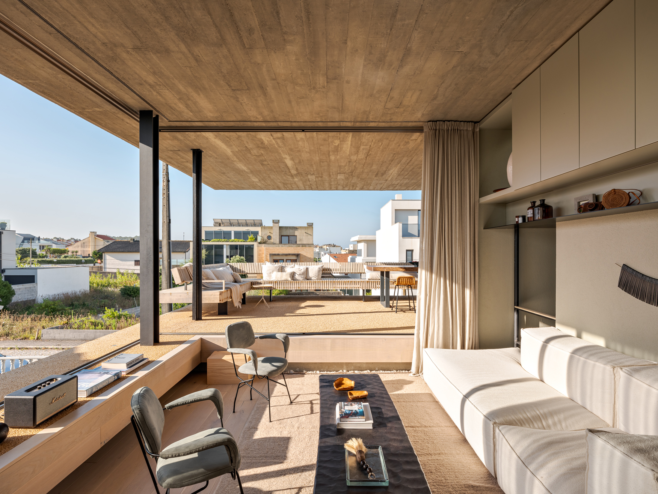 Looking out of the living room across the nearby houses at Casa Lavra in Portugal