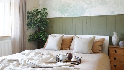 Green pattern lamp in white bedroom
