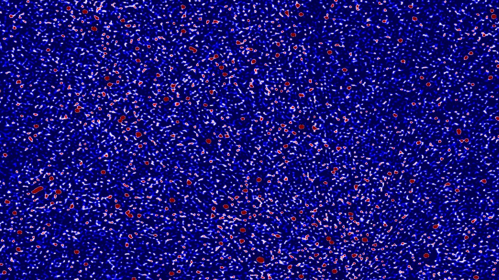 An image of part of the sky seen in radio wavelengths. New research removed many sources of nearby radio “noise” to focus on some of the earliest light in the universe.