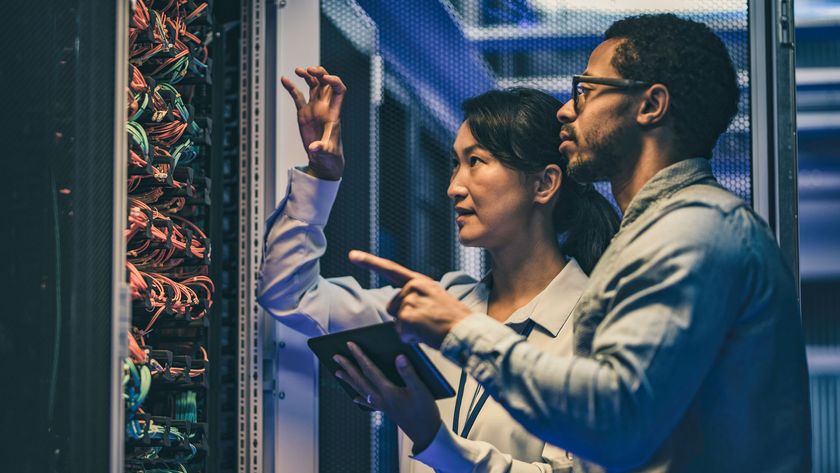 man and woman working in data center