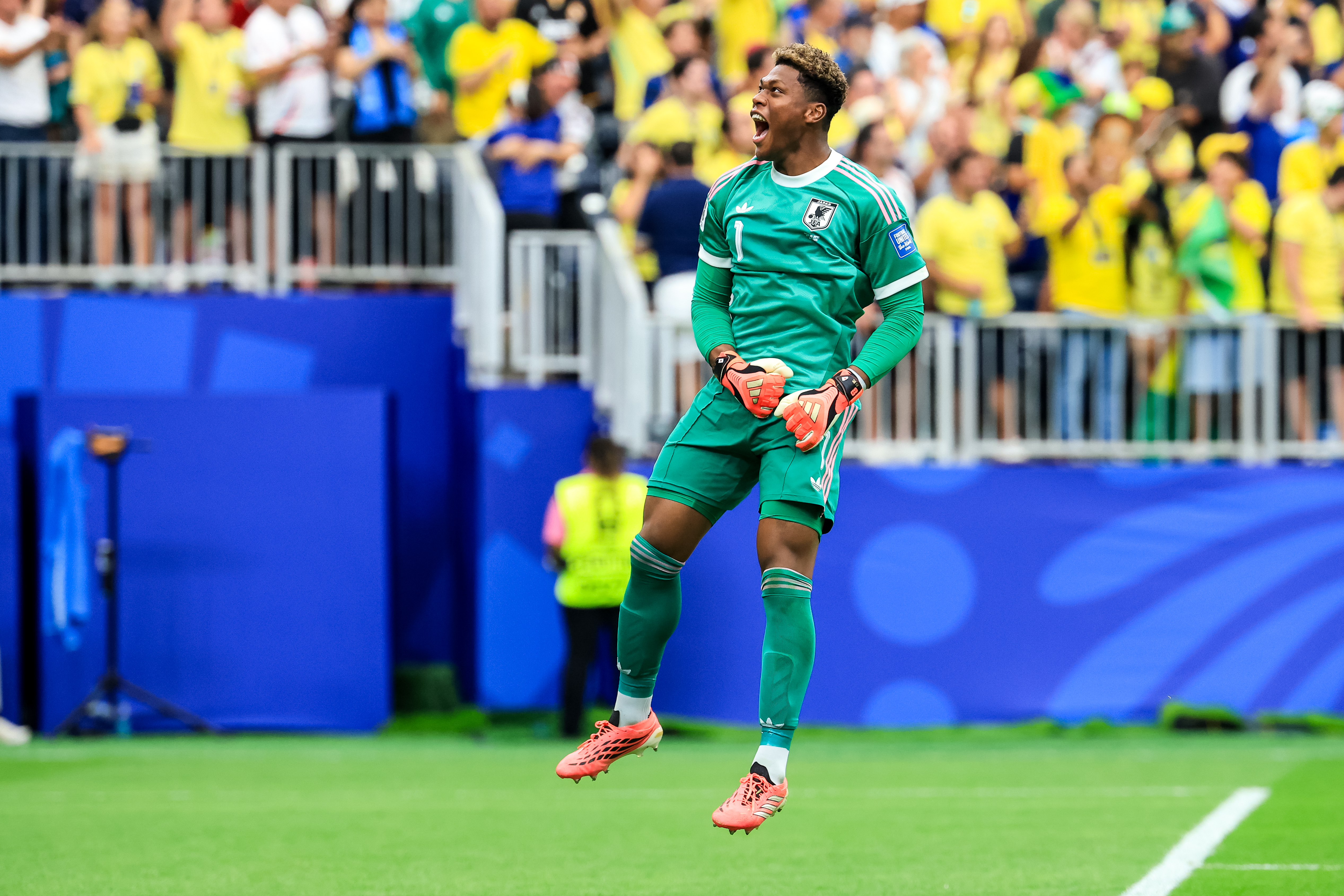 HOUSTON, TEXAS - JUNE 29: Japan goalkeeper Zion Suzuki celebrates his team&amp;apos;s first goal during the FIFA World Cup 2026 Round Of 32 match between Brazil and Japan at Houston Stadium on June 29, 2026 in Houston, Texas. (Photo by MB Media/Getty Images)