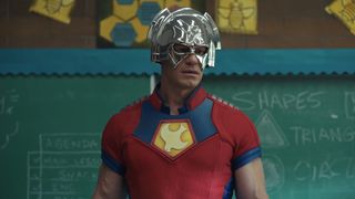 Chris Smith wearing his metahuman costume in a classroom in Peacemaker season 2