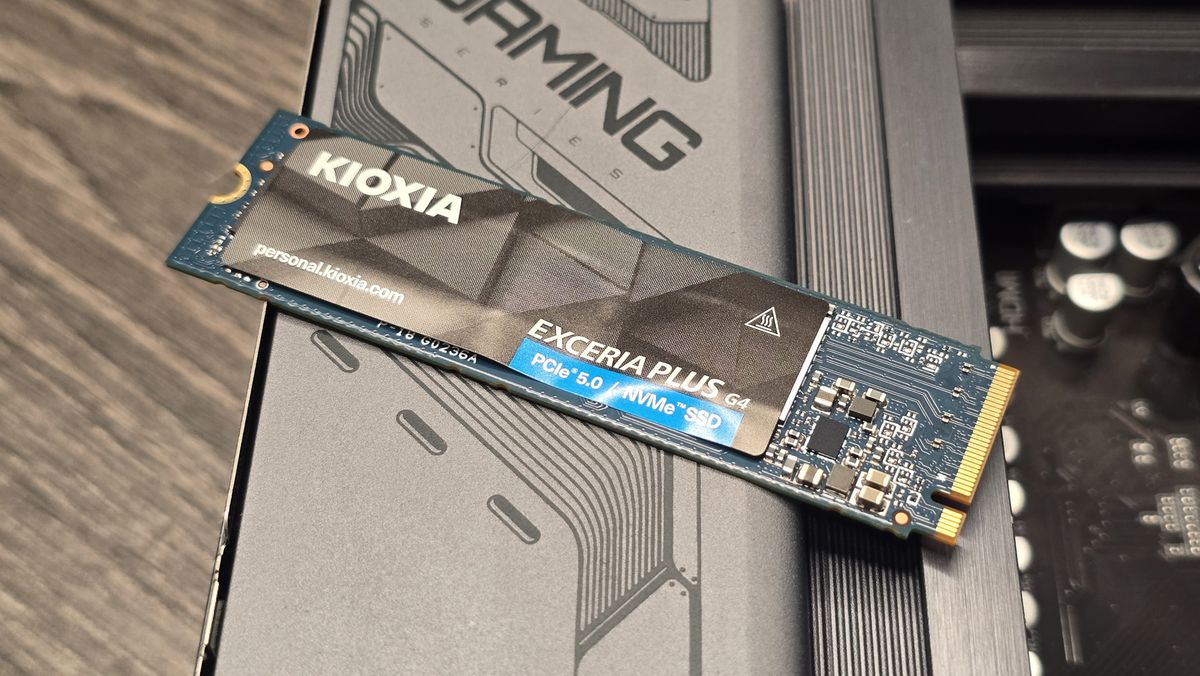 The Kioxia Exceria Plus G4 on a desk, ready to be installed inside a gaming PC.