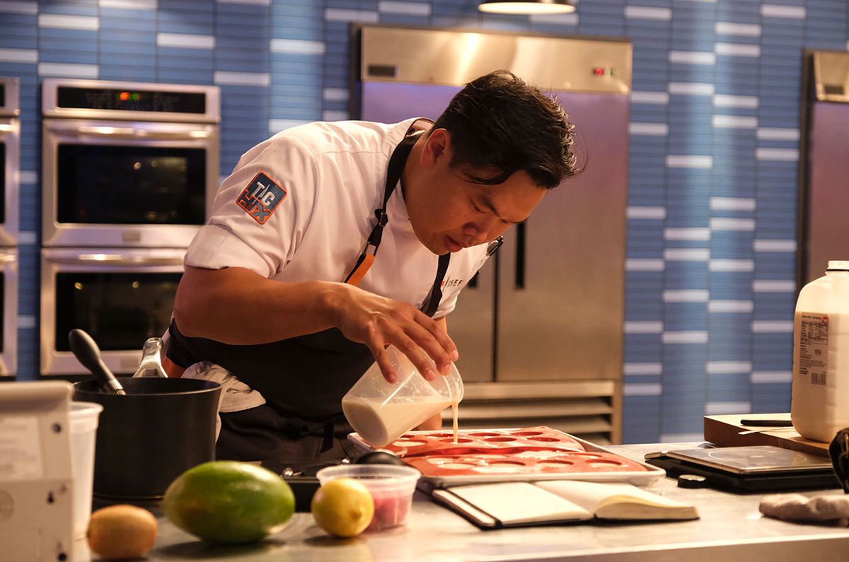 Top Chef: Houston cheftestant Buddha Lo fills molds with coconut cream to form golf balls as part of his Apollo 14-inspired &quot;Apavlova 14&quot; winning space food dish.