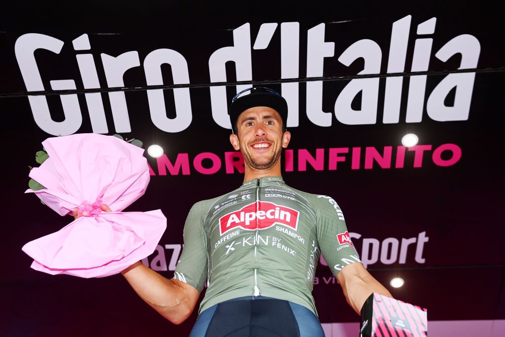 TREVISO ITALY MAY 26 Dries De Bondt of Belgium and Team Alpecin Fenix celebrates winning the stage on the podium ceremony after the 105th Giro dItalia 2022 Stage 18 a 156km stage from Borgo Valsugana to Treviso Giro WorldTour on May 26 2022 in Treviso Italy Photo by Tim de WaeleGetty Images
