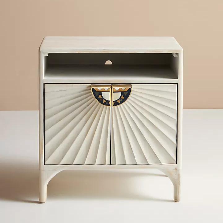 nightstand with ornate drawer pull and sunburst detailing
