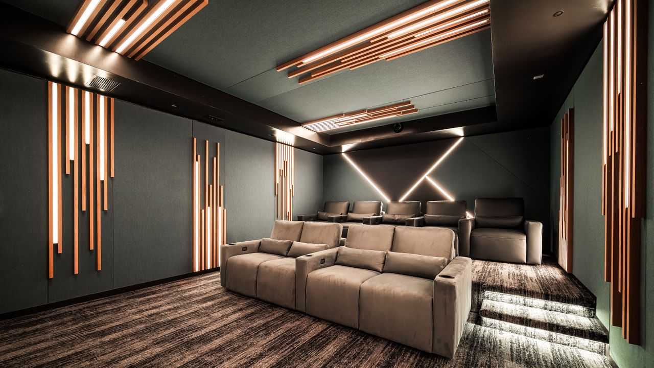 Home theater space showing comfortable seating and colored LED lights