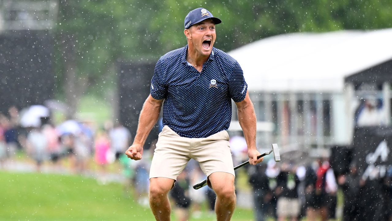 Bryson DeChambeau celebrates holing a putt