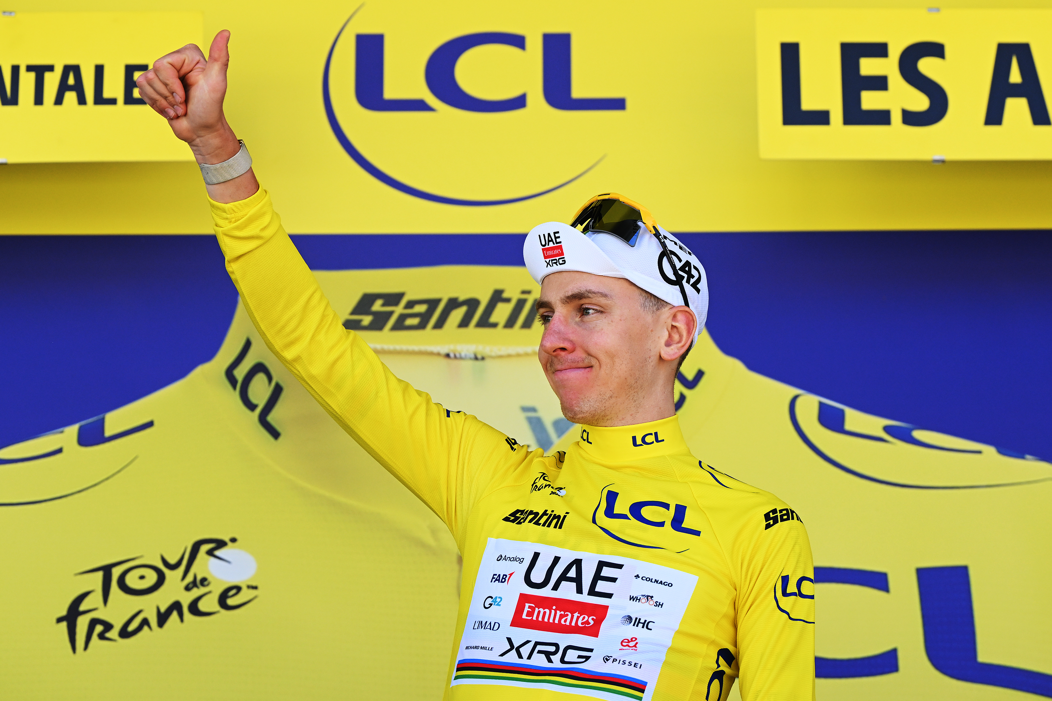 Tadej Pogacar at the podium of the Tour de France