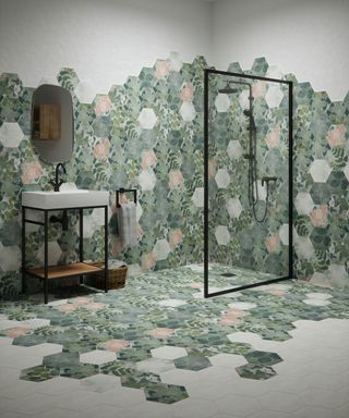 green floral hexagonal shaped tiles in shower running in a large section across the wall, floor and shower area