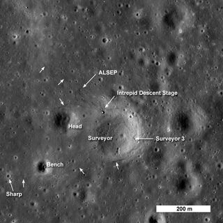 This image from the Lunar Reconnaissance Orbitershows the spacecraft's first look at the Apollo 12 landing site. The Intrepid lunar module descent stage, experiment package (ALSEP) and Surveyor 3 spacecraft are all visible. This image was released on Sept